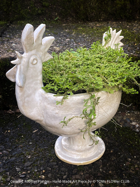 Hand-made ceramic rooster planter in beige–white glaze, standing 30cm tall, displayed without plant; unique 1/1 artisanal piece from TOMs FLOWer CLUB.