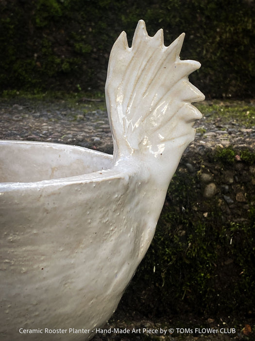 Top-down angle of the ceramic rooster planter showing the inner cavity sized for a 13cm pot; artistic, hand-formed ceramic design.