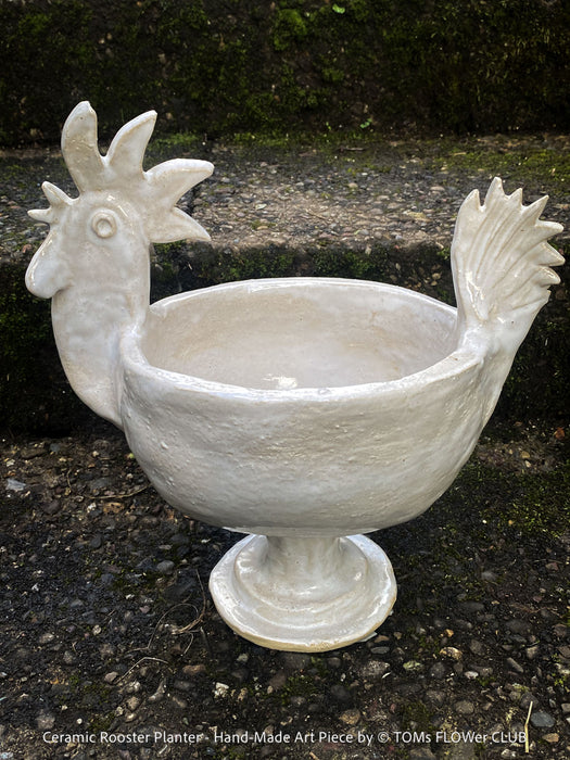 Rear view of the ceramic rooster planter illustrating the sculptural silhouette and stable base; handmade planter suitable for indoor plants.