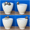 White, hand made, unique, ceramic plant pot with blue dots without drain hole with one sleeping black cat on the pot top directly from the artist's work shop, offered for sale by TOMs FLOWer CLUB.