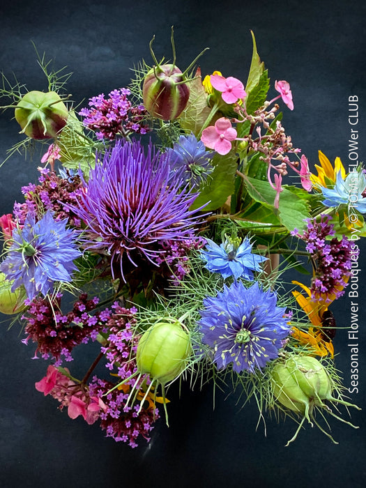 Natural seasonal autumn flowers arranged in an atmospheric bouquet