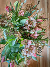 Wild and elegant spring bouquet made with fresh seasonal flowers