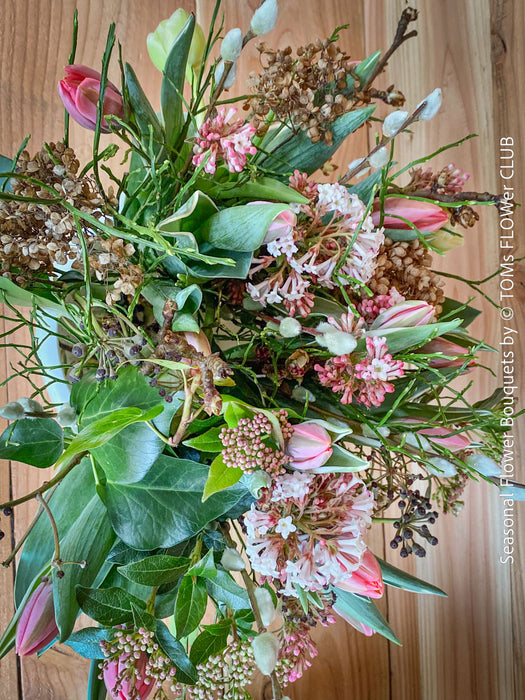 Wild and elegant spring bouquet made with fresh seasonal flowers