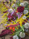 Elegant autumn bouquet with seasonal flowers, foliage and berries from TOMs FLOWer CLUB