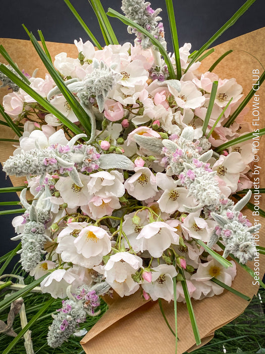 Colourful summer flower arrangement with fresh seasonal flowers