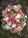 Elegant winter bouquet with seasonal flowers and natural branches with free delivery in Zurich