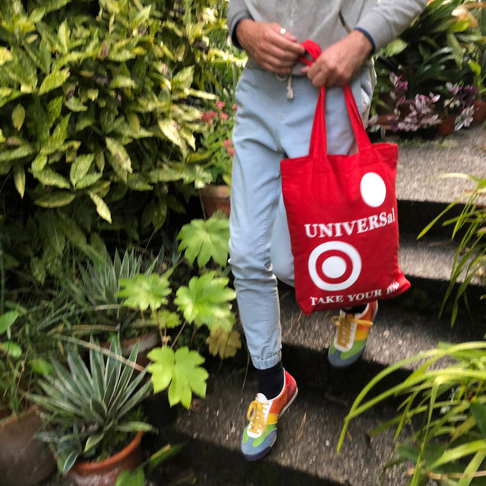 Red TAKE YOUR BAG with white UNIVERSAL design by TOMs FLOWer CLUB made of 100% organic cotton, EarthPositive® certified, various colours, Swiss designed, premium quality, world wide shipping.