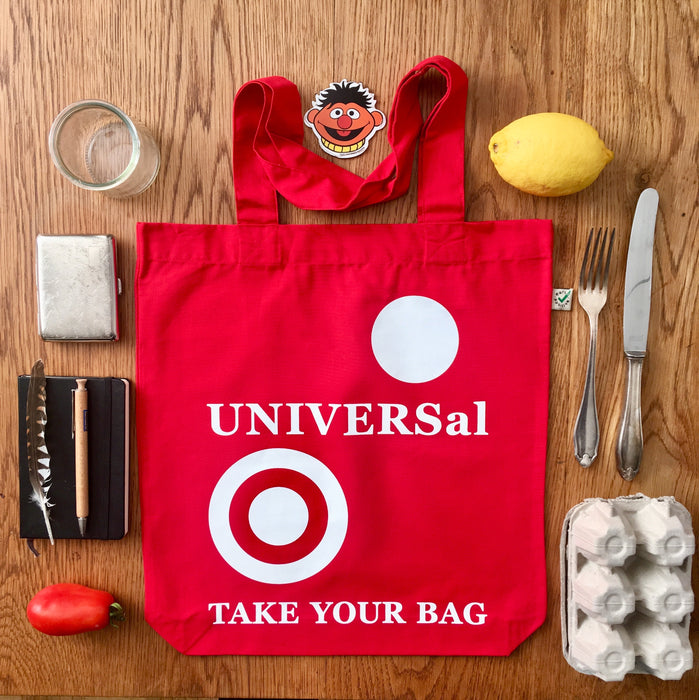 Red TAKE YOUR BAG with white UNIVERSAL design by TOMs FLOWer CLUB made of 100% organic cotton, EarthPositive® certified, various colours, Swiss designed, premium quality, world wide shipping.