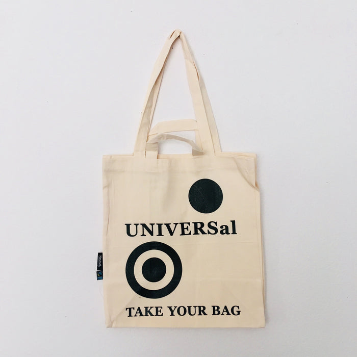 Beige TAKE YOUR BAG made of 100% organic cotton, NEUTRAL® and FAIRTRADE® certified with black UNIVERSAL design.