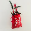 Red TAKE YOUR BAG with white TOMs ART FLOWer CLUB design by TOMs FLOWer CLUB made of 100% organic cotton, EarthPositive® certified, various colours, Swiss designed, premium quality, world wide shipping.