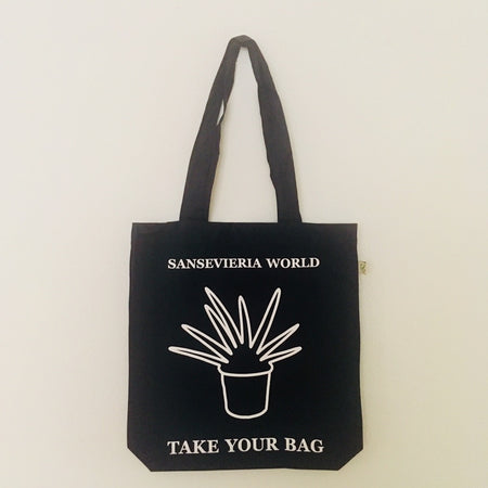 Black TAKE YOUR BAG with white SANSEVIERIA WORLD design by TOMs FLOWer CLUB made of 100% organic cotton, EarthPositive® certified, various colours, Swiss designed, premium quality, world wide shipping.