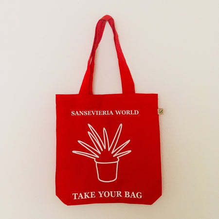 Red TAKE YOUR BAG with white SANSEVIERIA WORLD design by TOMs FLOWer CLUB made of 100% organic cotton, EarthPositive® certified, various colours, Swiss designed, premium quality, world wide shipping.
