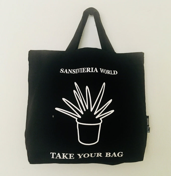 Black TAKE YOUR BAG with white SANSEVIERIA WORLD design made of 100% organic cotton, NEUTRAL® and FAIRTRADE® certified.