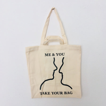 Beige TAKE YOUR BAG made of 100% organic cotton, NEUTRAL® and FAIRTRADE® certified with black ME & YOU design.