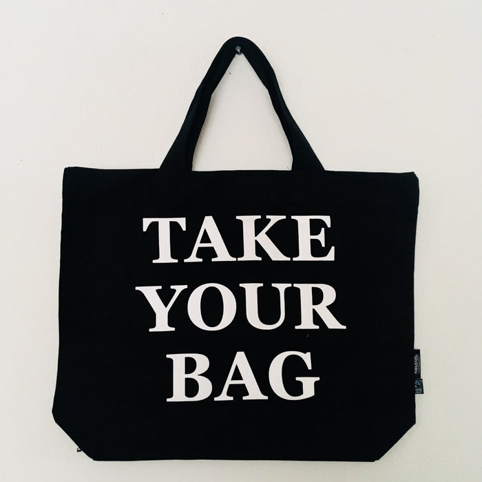 Schwarze TAKE YOUR BAG mit weißem Design aus 100% Bio-Baumwolle, NEUTRAL® und FAIRTRADE® zertifiziert.