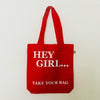 Red TAKE YOUR BAG with white HEY GIRL design by TOMs FLOWer CLUB made of 100% organic cotton, EarthPositive® certified, various colours, Swiss designed, premium quality, world wide shipping.