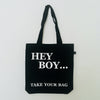 Black TAKE YOUR BAG with white HEY BOY design by TOMs FLOWer CLUB made of 100% organic cotton, EarthPositive® certified, various colours, Swiss designed, premium quality, world wide shipping, Boy George, Boyzone, Philipp Boy