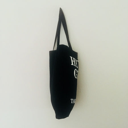 Black TAKE YOUR BAG with white HEY BOY design by TOMs FLOWer CLUB made of 100% organic cotton, EarthPositive® certified, various colours, Swiss designed, premium quality, world wide shipping.