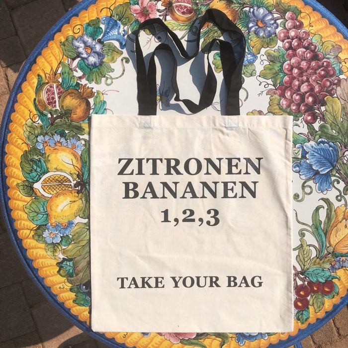 ZITRONEN, BANANEN, 1,2,3 - beige bag with black handle - 38 x 42 cm