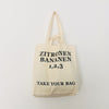 Beige TAKE YOUR BAG made of 100% organic cotton, NEUTRAL® and FAIRTRADE® certified with black ZITRONEN, BANANEN, 1, 2, 3 design.