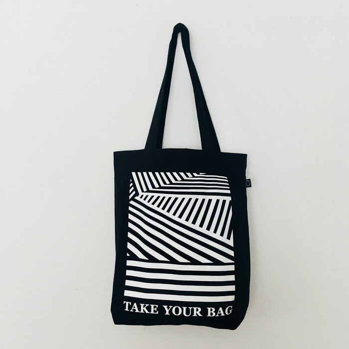 Black TAKE YOUR BAG with white LINEAR design by TOMs FLOWer CLUB made of 100% organic cotton, EarthPositive® certified, various colours, Swiss designed, premium quality, world wide shipping.