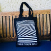 Black TAKE YOUR BAG with white LINEAR design by TOMs FLOWer CLUB made of 100% organic cotton, EarthPositive® certified, various colours, Swiss designed, premium quality, world wide shipping.
