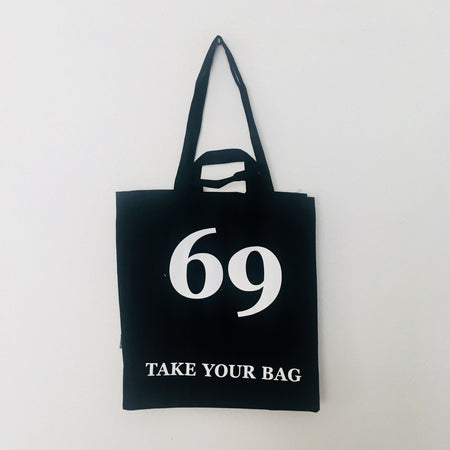 Black TAKE YOUR BAG made of 100% organic cotton, NEUTRAL® and FAIRTRADE® certified with white 69 design.