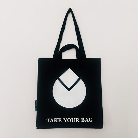 Black TAKE YOUR BAG made of 100% organic cotton, NEUTRAL® and FAIRTRADE® certified with white WATER DROP design.