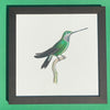 Hummingbird print on paper, 25 x 25cm, by Rafael Neff (represented by LUMAS), from the "Small Open Edition", 2011, in brown wooden frame 28x28cm behind glass for sale by TOMs FLOWer CLUB.
