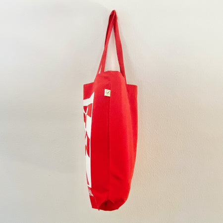 Red TAKE YOUR BAG with white TULIP design by TOMs FLOWer CLUB made of 100% organic cotton, EarthPositive® certified, various colours, Swiss designed, premium quality, world wide shipping.
