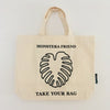 Beige TAKE YOUR BAG with black MONSTERA FRIEND design made of 100% organic cotton, NEUTRAL® and FAIRTRADE® certified, Monstera, Monstera friend, Baumwolltasche, Stofftasche, tote bag, shopping bag, TOMs FLOWer CLUB, TAKE YOUR BAG, organic cotton, bio Baumwolle. Einkaufen, Einkaufstasche 