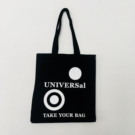 A black cotton tote bag with the text 'UNIVERSal' and 'TAKE YOUR BAG' printed in white on the front.