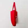 Red TAKE YOUR BAG with white UNIVERSAL design by TOMs FLOWer CLUB made of 100% organic cotton, EarthPositive® certified, various colours, Swiss designed, premium quality, world wide shipping.