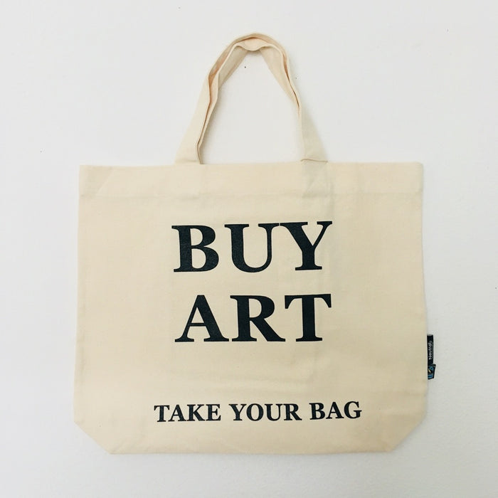 Beige TAKE YOUR BAG with black BUY ART design made of 100% organic cotton, NEUTRAL® and FAIRTRADE® certified.