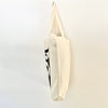 Side view of eco-friendly organic cotton tote bag – Tulip by TOMs FLOWer CLUB