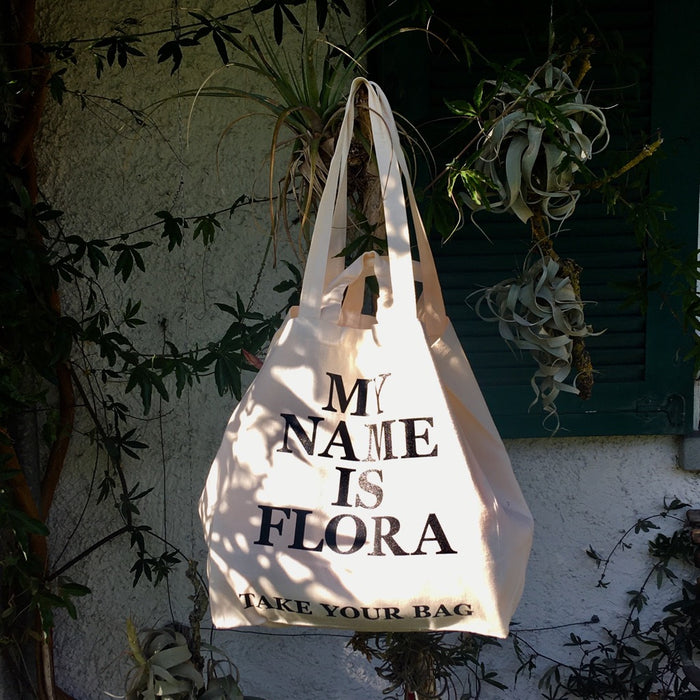 Organic cotton, certified cotton bags, Swiss design, TAKE YOUR BAG, TOMS FLOWER CLUB, Stofftasche, tote bag, shopping bag, Einkaufstasche, NEUTRAL, Certified Responsibility, EarthPositive, FAIRTRADE, my name is Flora